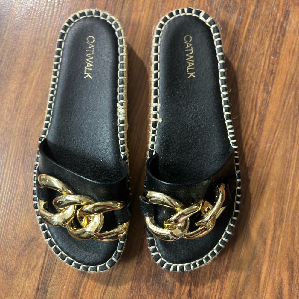 Black and gold sandals